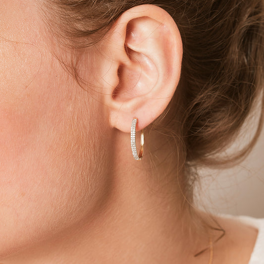 Gold hoop earrings and 2 rows of diamonds