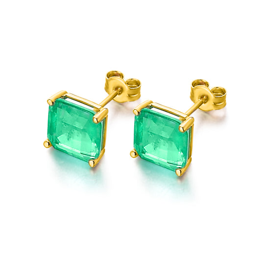Earrings in gold and green topaz.