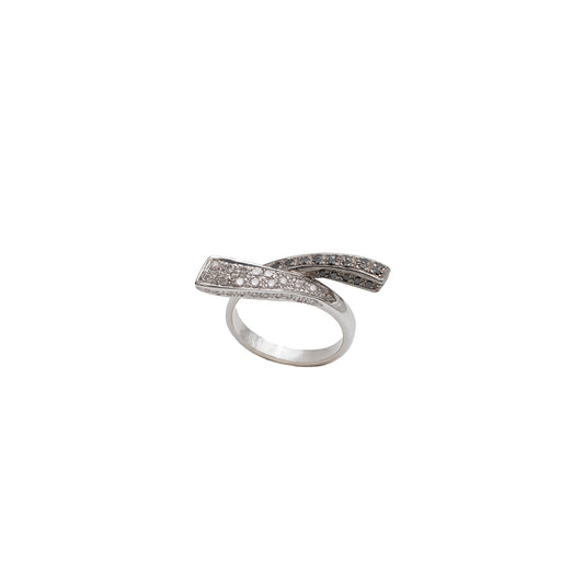 White gold ring with black and white diamonds.