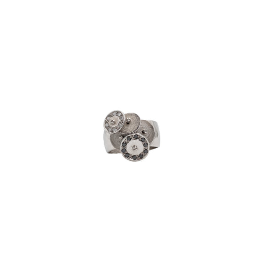White gold ring with white gold discs and diamonds.