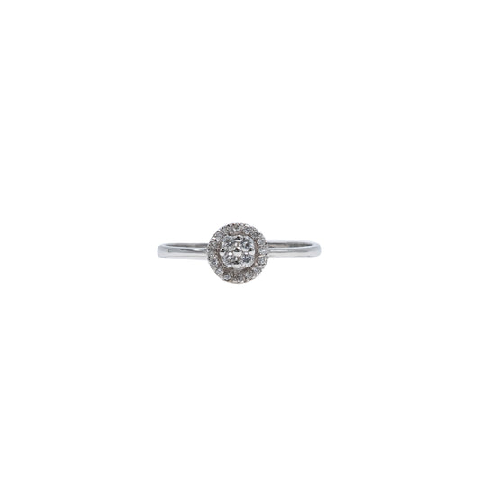 White gold solitaire ring with a central diamond circle.