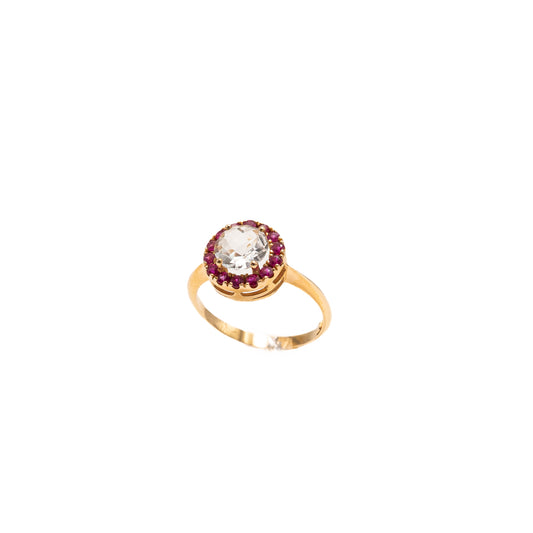 Ring in gold, topaz and rubies.
