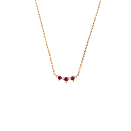 Fio em ouro com travessão de rubis e diamantes